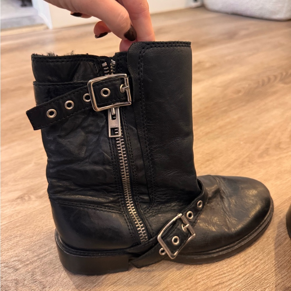 All saints black leather biker boots with faux fur inside and size zipper/buckle